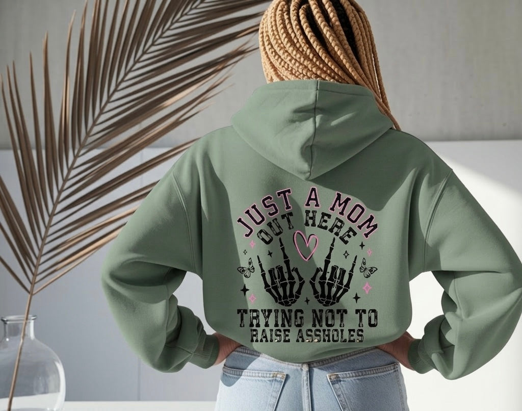 Just a Mom Trying Not to Raise Aholes Hoodie