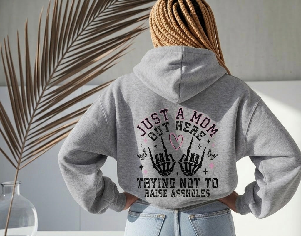 Just a Mom Trying Not to Raise Aholes Hoodie