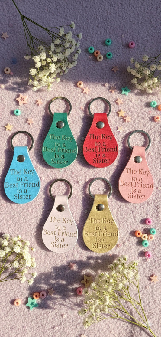 “The Key to a Best Friend Is a Sister” Keychain – Sentimental Sister Gift